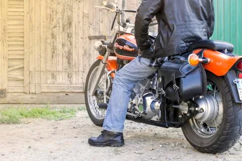 Man sitting on a motorcycle 库存照片
