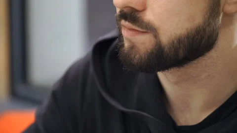 Man is sitting in night cafe Stock Footage 86387525