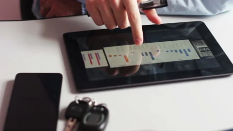 Man Is Sitting In The Office Behind A Tablet Stock Footage 91651541