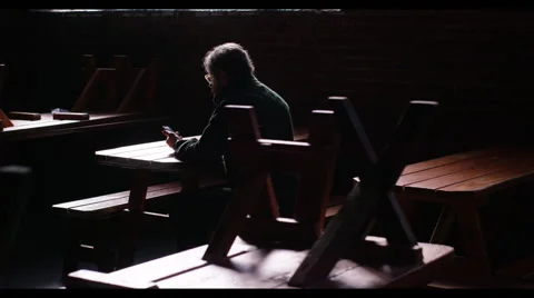 Man sitting in a restaurant 動画素材 61503731