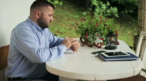 Man sitting with smartwatch Stock Footage 56241390