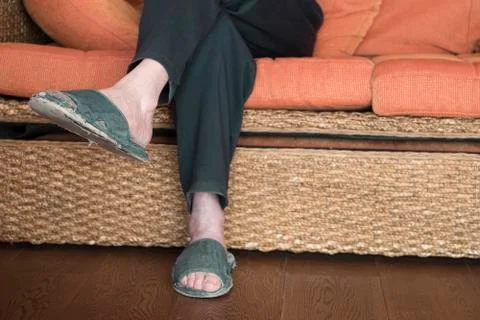 Man Sitting On Sofa Photos