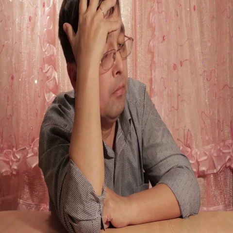 Man sitting at a table upset. Stock Footage 69723620