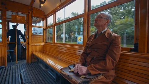 Man sitting in tram 動画素材 81702568