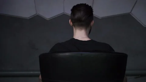 Man is sitting turning away Stock Footage 86253225