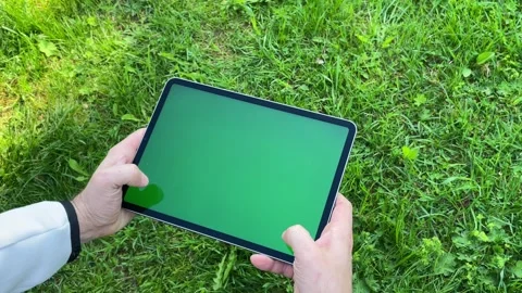 Man sitting using digital tablet Video stock 243010732