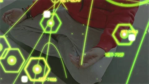 Man sitting while neon hex nodes appearing, pulsing, mapping hand gestures for Stock Footage 333837839
