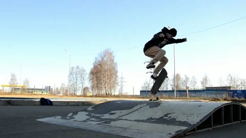 Man on skateboard performs a tricks Stock Footage 131125152