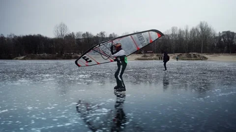 A man skates with a hand wing Stock Footage 233457243