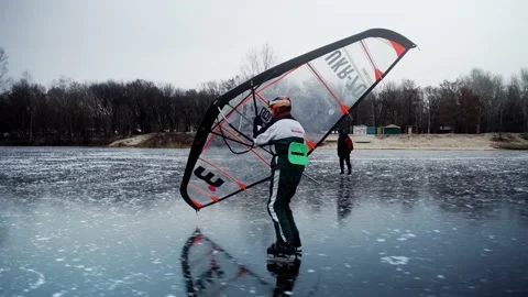 A man skates with a hand wing Stock Footage 233457253