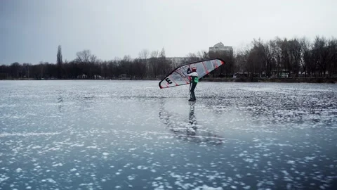 A man skates with a hand wing Stock Footage 233457278