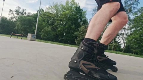 Man skates on roller blades in extreme park Stock Footage 276119451
