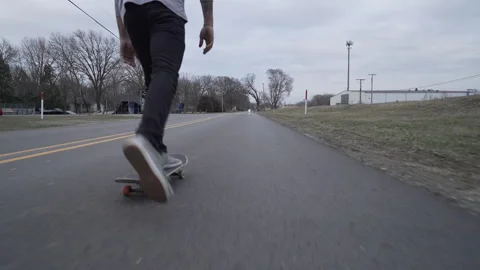 Man skating road, slow motion Stock Footage 260993237