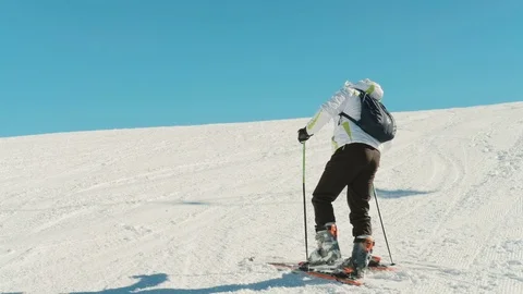 Man with ski at a ski resort on a clear and cold weather, Montenegro, Kolashin Stock Footage 88604172