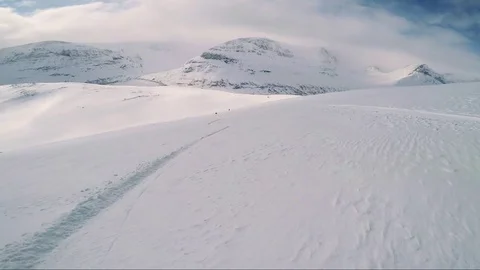 Man skier skiing down mountain with friends - sunny day - first person view Stock-Footage 74992817
