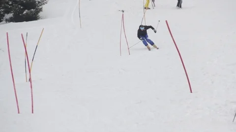 Man skiing and falling Stock Footage 90814076