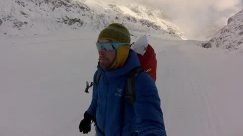 Man skiing down mountain. Stock Footage 68497822