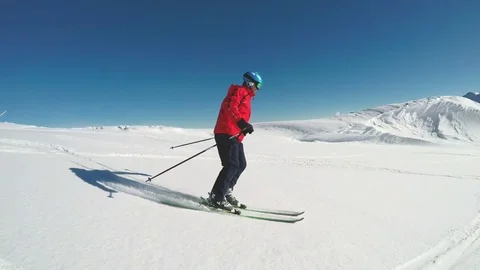 Man skiing on the prepared slope with fresh new powder snow in Alps Stock-Footage 73871191