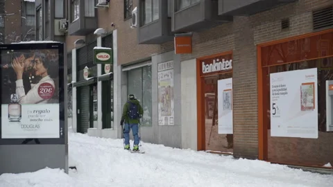 Man Skiing on Sidewalk Stock Footage 146345310