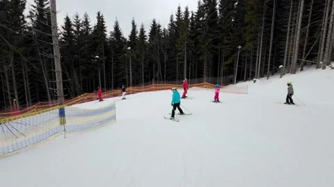 Man skiing ski slope in the evening. POV. Stock Footage 219014545