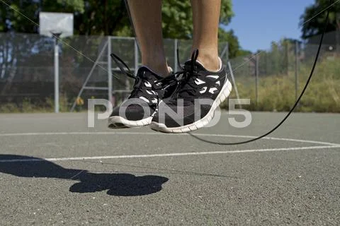 Man skipping with a jump rope Stock Photos