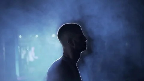 Man skipping on rope with back light. close-up Stock Footage 80862270