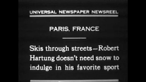 A man skis without snow on the streets of Paris France in 1930. Stock Footage 106905454