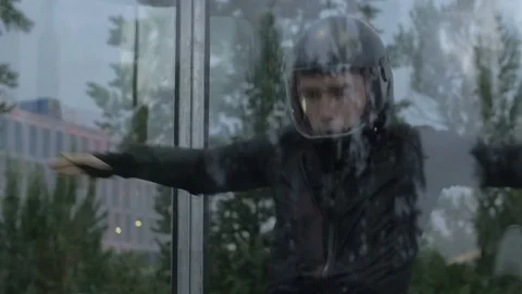 Man skydiver flying in air wind tunnel slow motion. Extreme parachuting Stockbeeldmateriaal 82245446