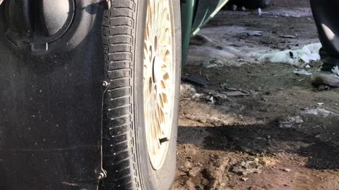 Man Slashes Tires Close Up Video stock 101198680