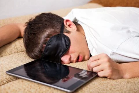Man sleep with a Tablet Foto stock