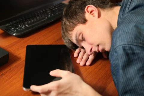 Man sleep with Tablet Foto stock