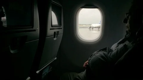 Man sleeping on airplane Stock Footage 83551660