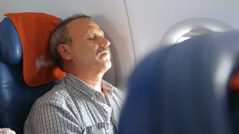 Man sleeping in the airplane Video stock 96037896