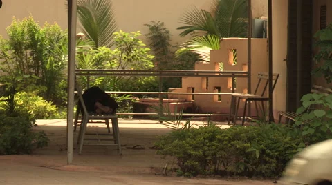Man sleeping on a bench Stock Footage 51436414