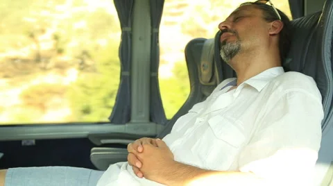 Man Sleeping In Bus 2 Stock Footage 64725157