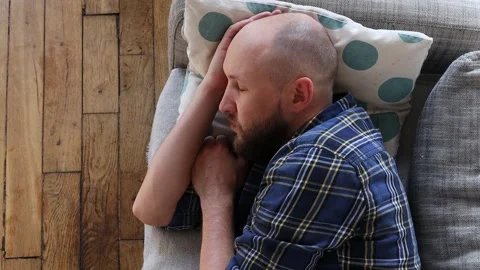 Man sleeping lying on the sofa. Stock Footage 254908533