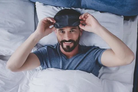 Man in sleeping mask Stock Photos