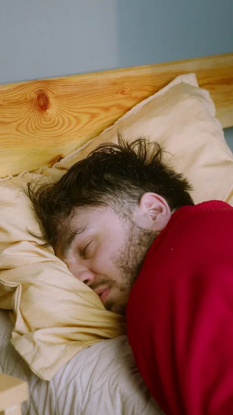 Man Sleeping Peacefully in Bed  Deep Sleep or Tired Rest ,vertical video Stock Footage 303743044