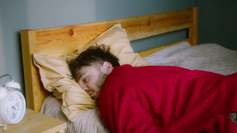 Man Sleeping Peacefully in Bed  Deep Sleep or Tired Rest Stock Footage 303916511