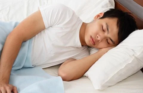 Man sleeping Stock Photos