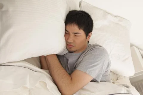 Man sleeping Stock Photos