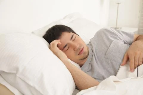 Man sleeping Stock Photos