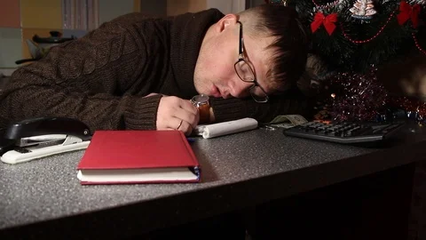 Man sleeping at the table Stock Footage 100753879