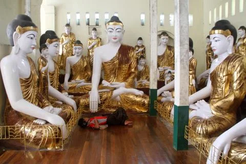 Man sleeping in temple Stock Photos