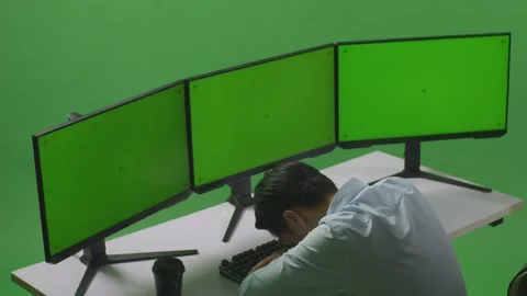 Man Sleeping While Working With Mock Up Multiple Computer Monitor In Green Stock Footage 249634929