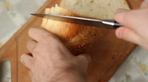 Man Slices Bread Stock Footage 34185275
