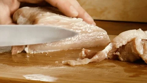 Man slices meat Stock Footage 78305126