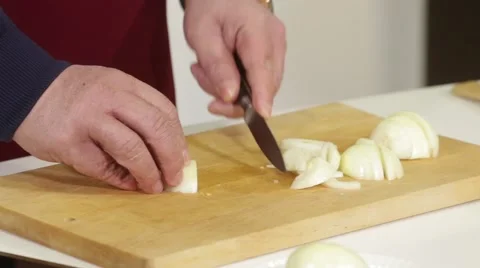A man slices onion Stock Footage 49783883
