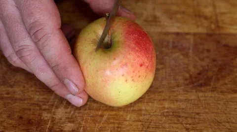 Man slicing an Apple Stock Footage 35649901