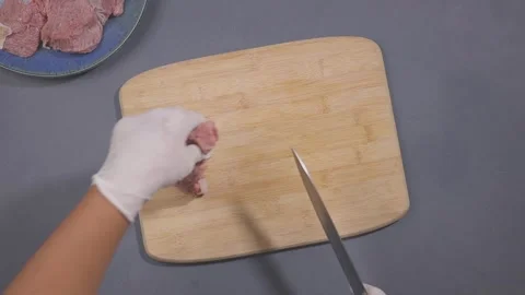 A man slicing beef meat  Stock Footage 155802055